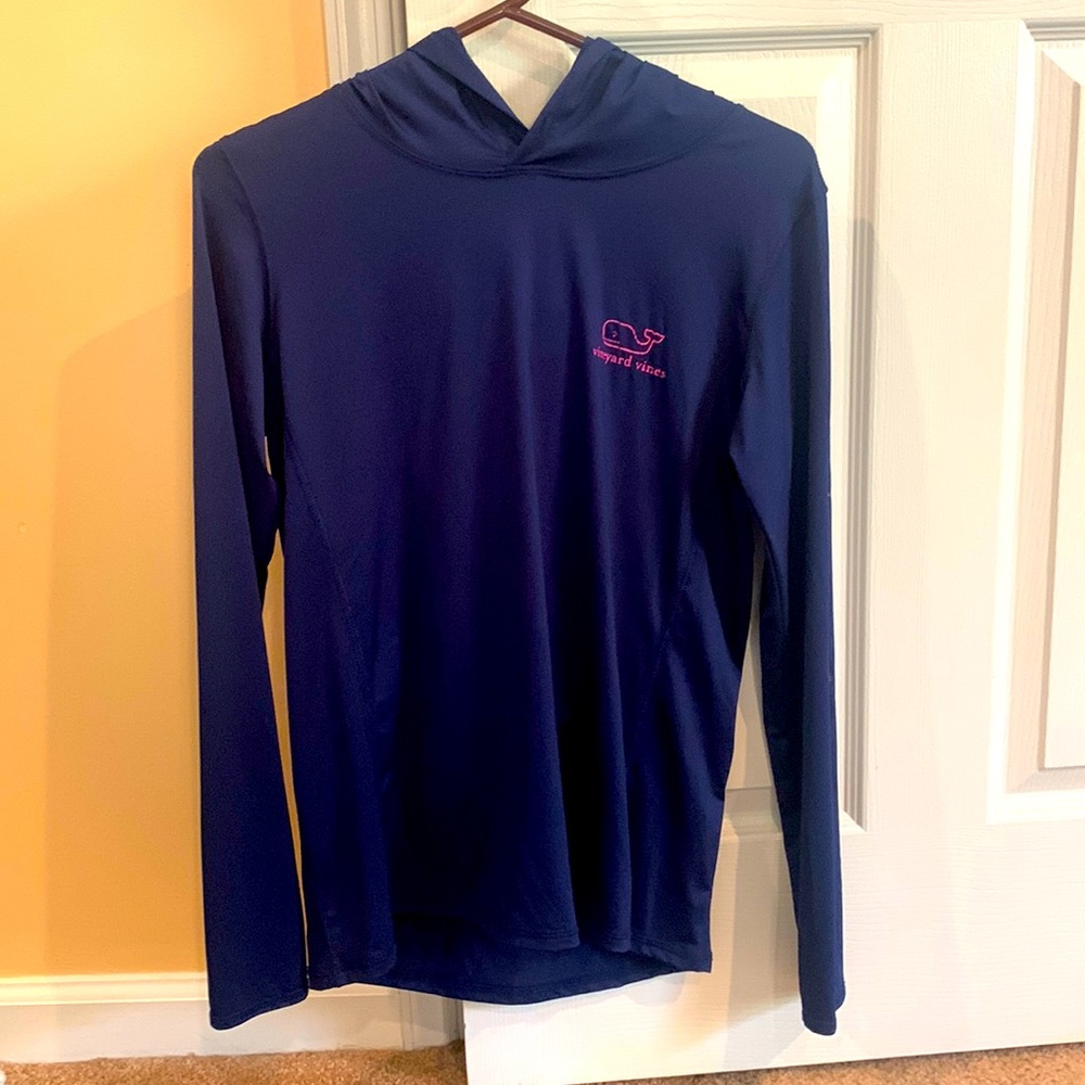 Vineyard Vines dry fit long sleeve shirt with hood and small zipper pocket.